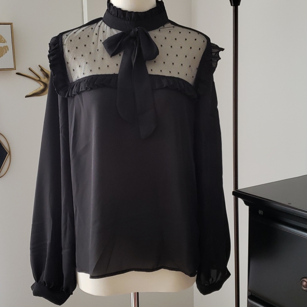 Black blouse. Cute bow!